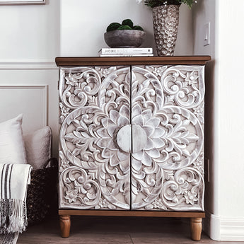 Shop the Vintage Accent Cabinet with Silver Flower Design and enhance your decor with timeless charm!